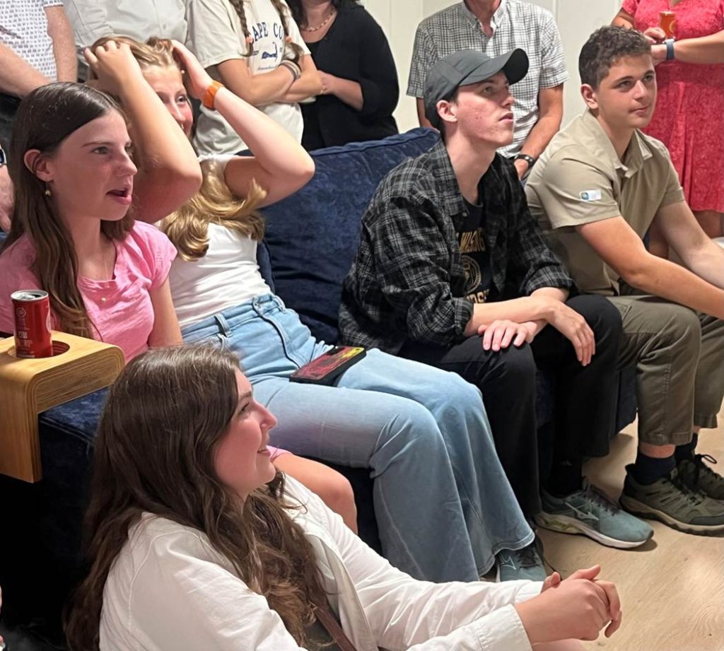 SilverSat team members and supporters including Sabrina Carle, Charlotte Kistler, Aubrey Forsgren, Dominik Honzak and Matthew Kay watch Sunday’s launch at the home of Noah Meier.